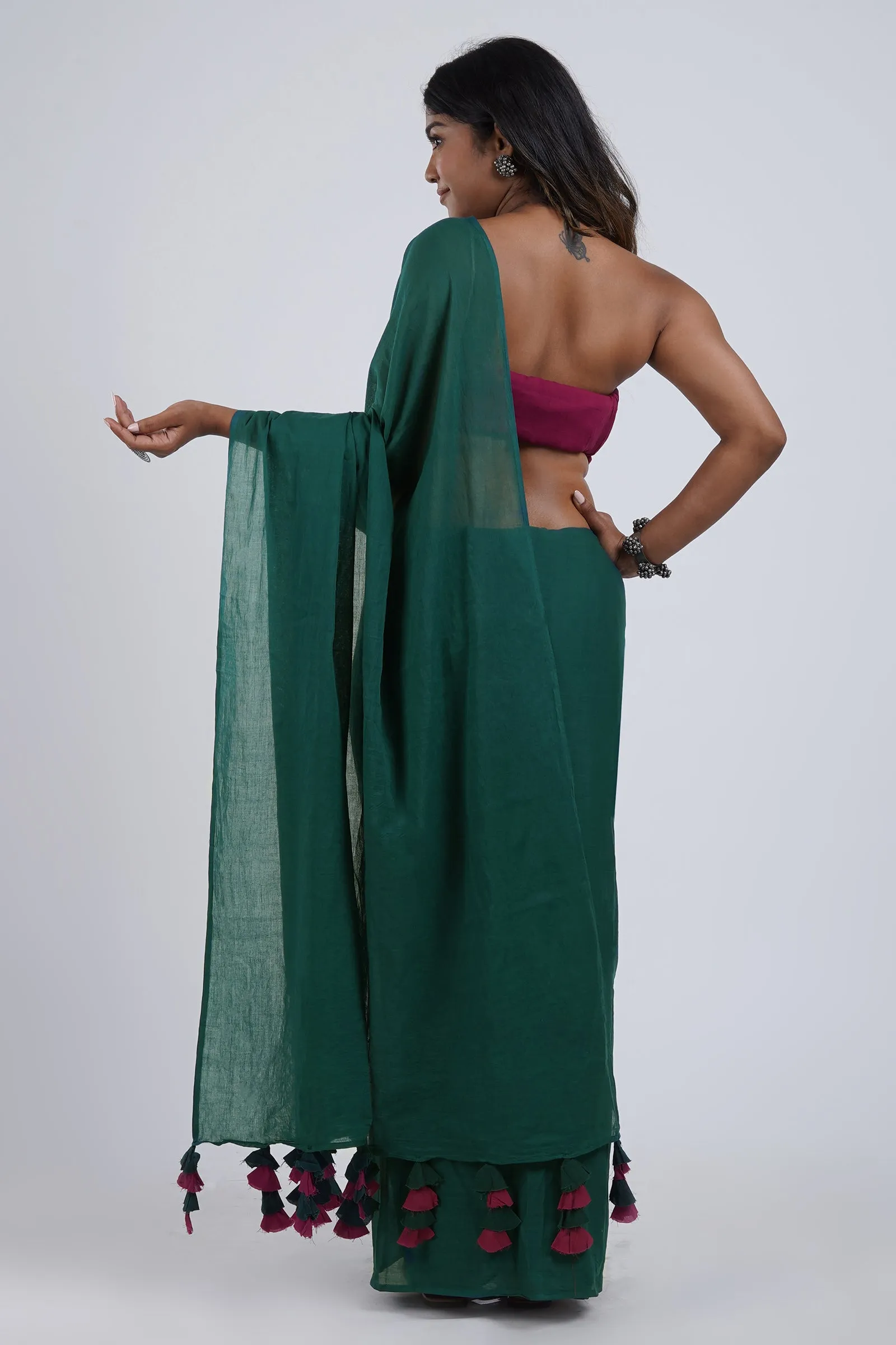 Teejh Hue Haze Dark Green and Magenta Mulmul Saree
