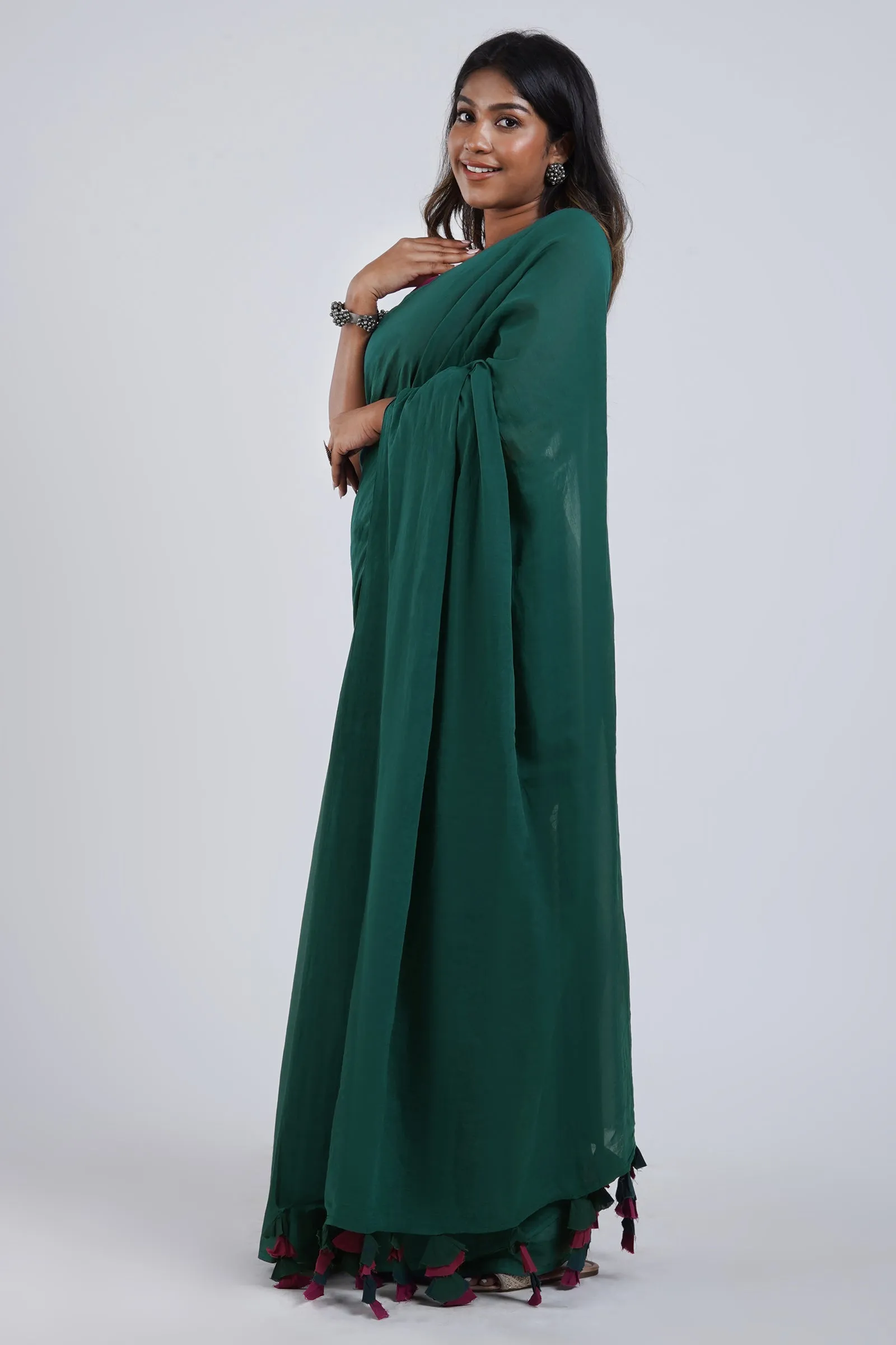 Teejh Hue Haze Dark Green and Magenta Mulmul Saree