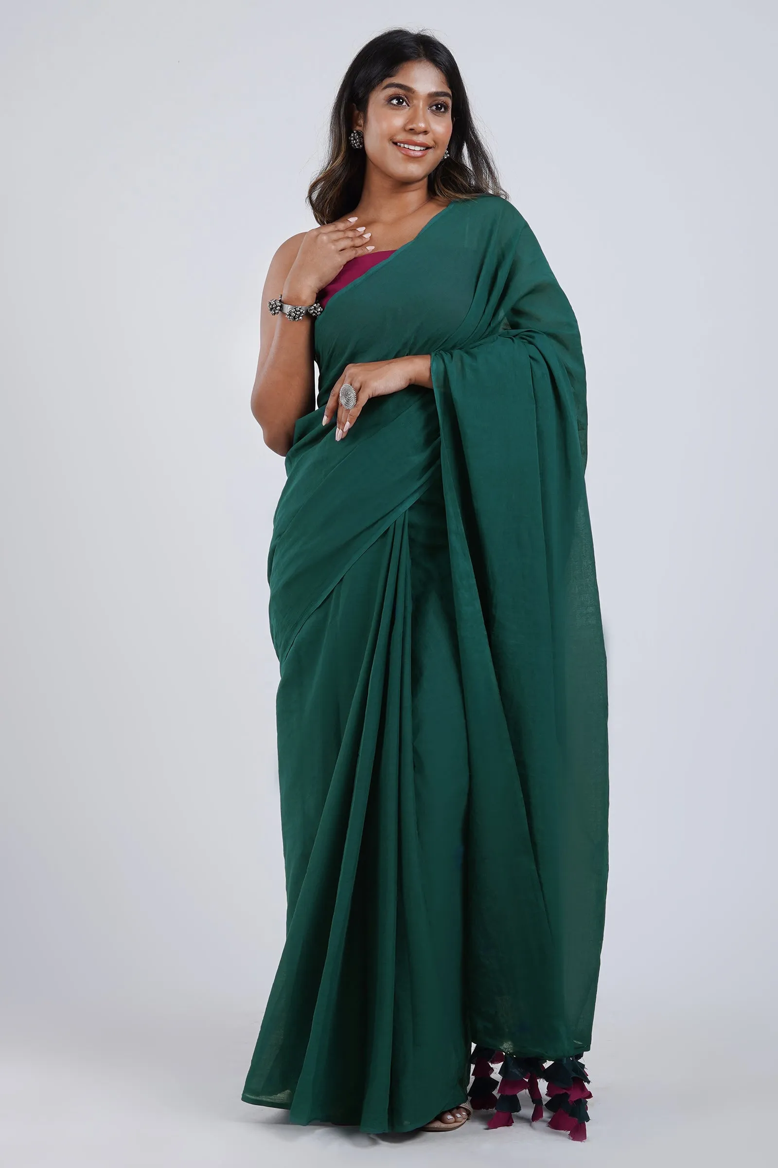 Teejh Hue Haze Dark Green and Magenta Mulmul Saree